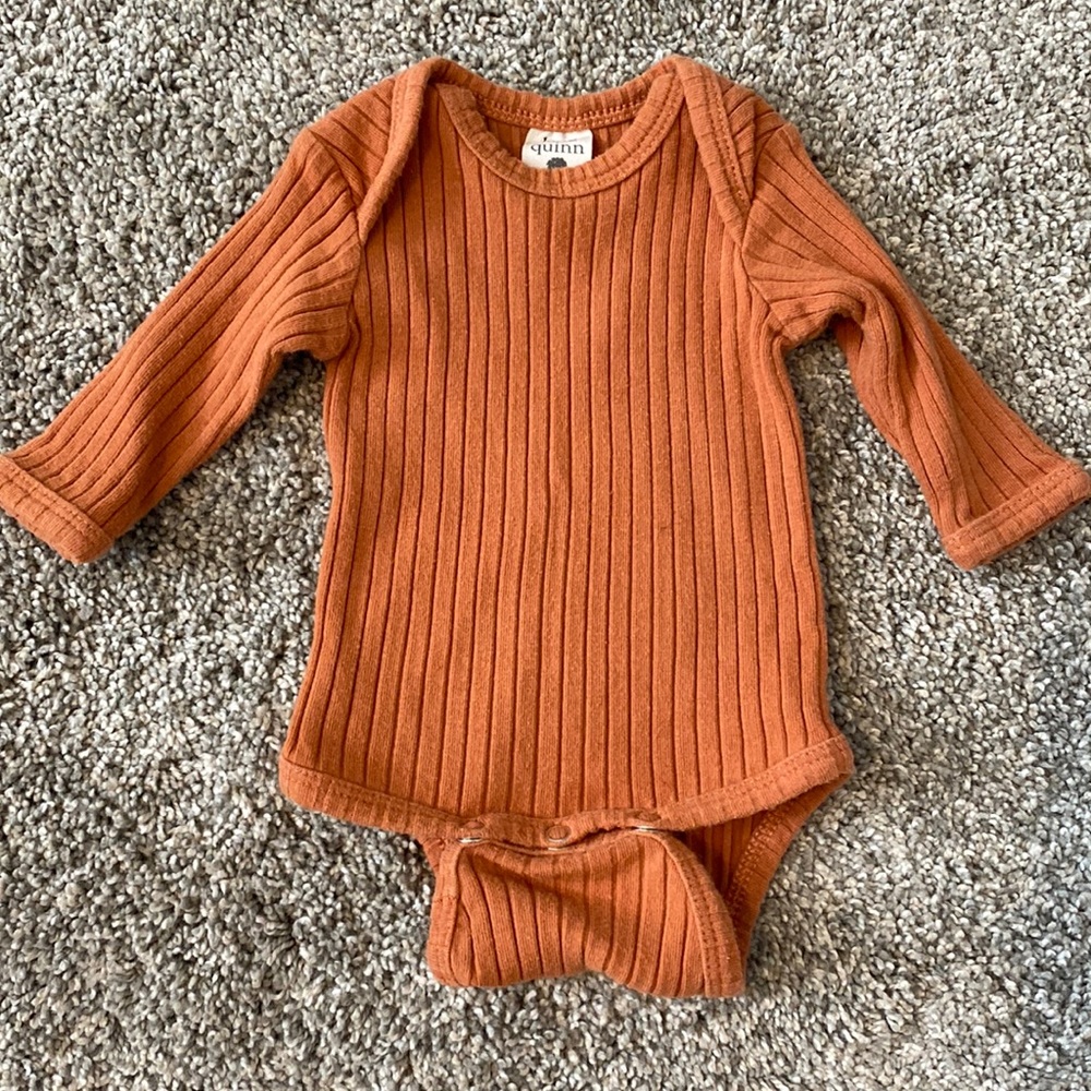 Kate Quinn Onesie